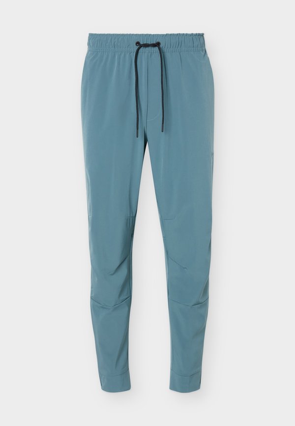 Nike Performance UNLIMITED - Tracksuit bottoms - mineral slate/black