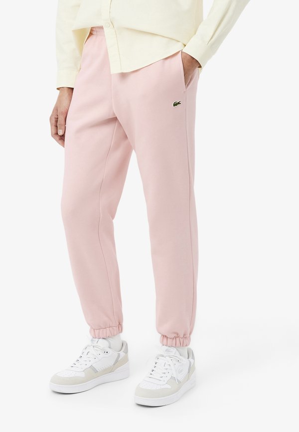 Lacoste Tracksuit bottoms - rose pale-ady