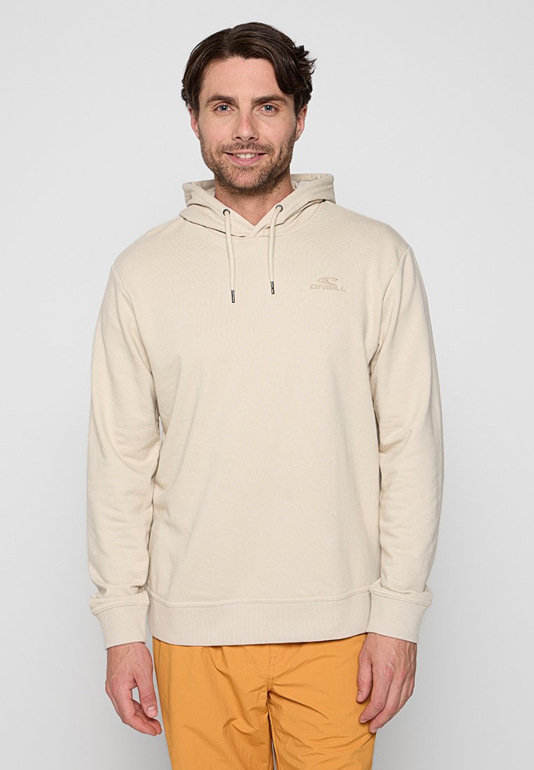 Beige Kapuzenpullover aus weichem Material. Mit Kordelzügen, einem gerippten Saum und einem schlichten Logodetail. Lange Ärmel mit lockerer Passform.
