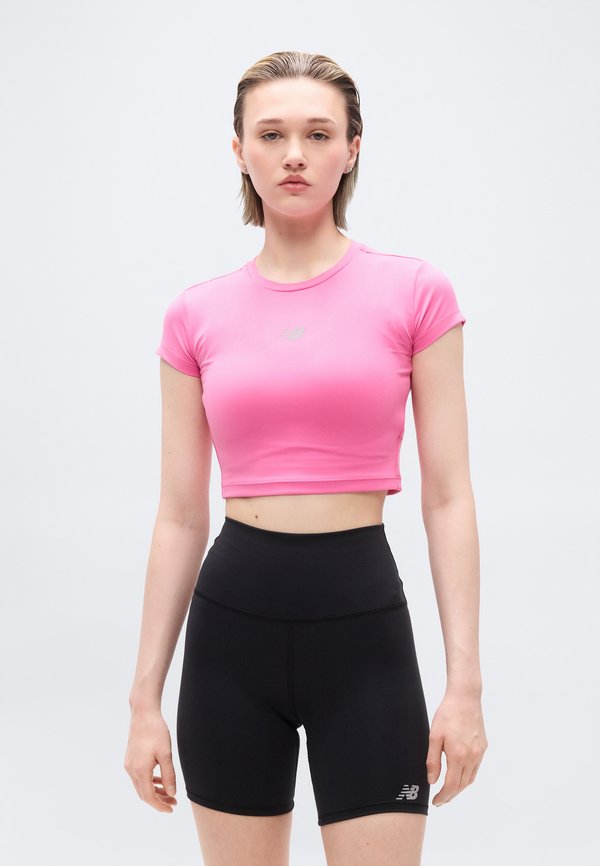 New Balance HARMONY - Sports T-shirt - pink