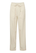 Beige Hosen mit elastischem Bund und Kordelzug, zwei Vordertaschen und lockerer Passform, aus weichem, atmungsaktivem Stoff.