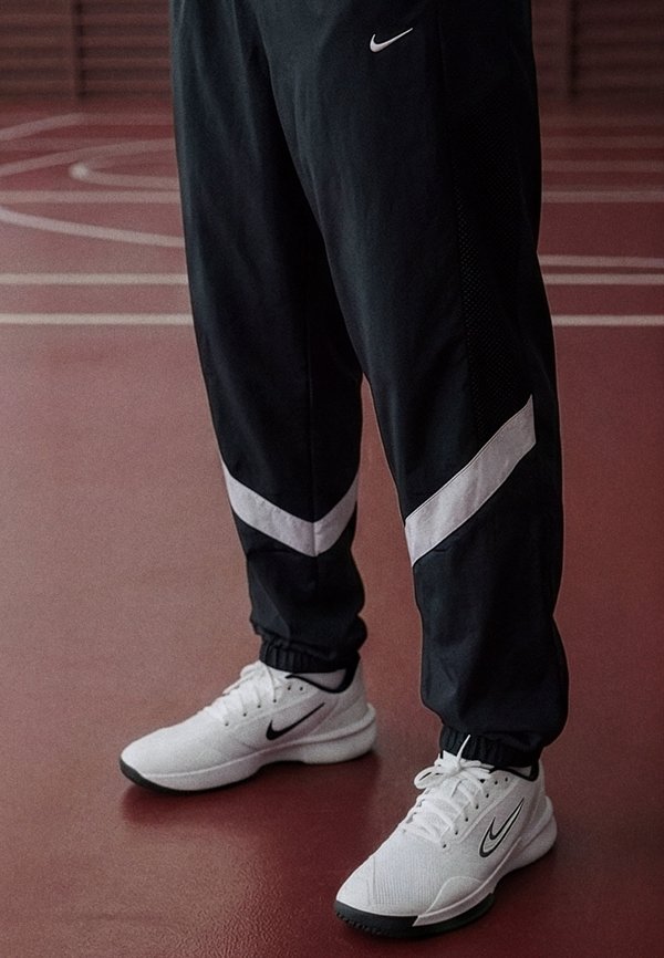 Nike Performance WOVEN ICON PANT STARTING FIVE - Tracksuit bottoms - black/white