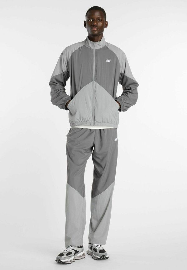 New Balance SPORT LEGACY PANT - Tracksuit bottoms - castlerock slate grey