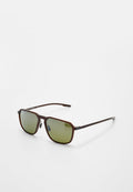 Braune Sonnenbrille mit Metallfassung, quadratischen grün getönten Gläsern und verstellbaren Nasenpads auf weißem Hintergrund.