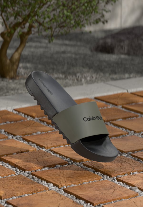 Calvin Klein CHUNKY POOL SLIDE - Mules - smokey olive/black