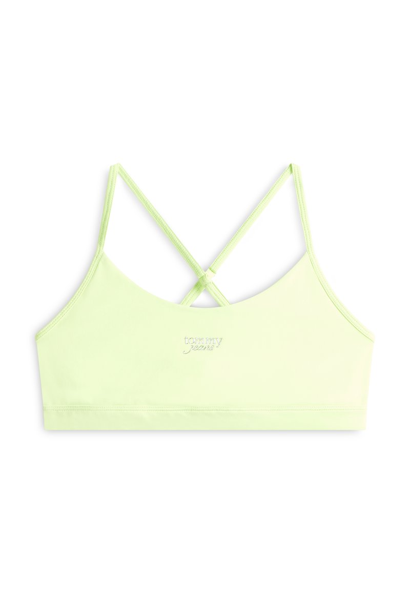 Hellgrünes bauchfreies Tanktop mit dünnen, überkreuzten Trägern und kleinem "tommy jeans"-Logo mittig auf der Vorderseite.