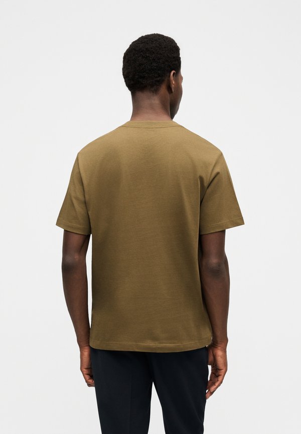 Calvin Klein WHOLESALE SPORTSWEAR GRAP GRAPHIC TEE