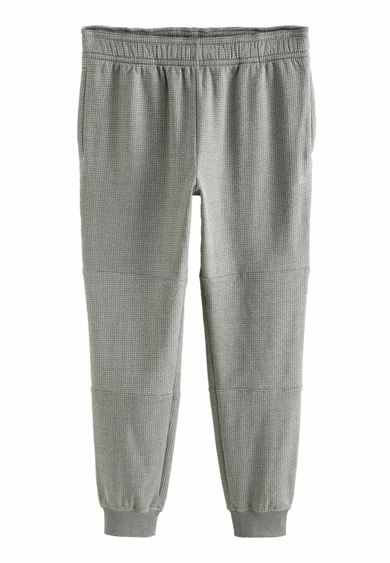 Graue, texturierte Jogginghosen mit einem gerippten Muster, elastischem Bund und umgeschlagenen Knöcheln. Sie verfügen über ein tailliertes Design und einen weichen Stoff.