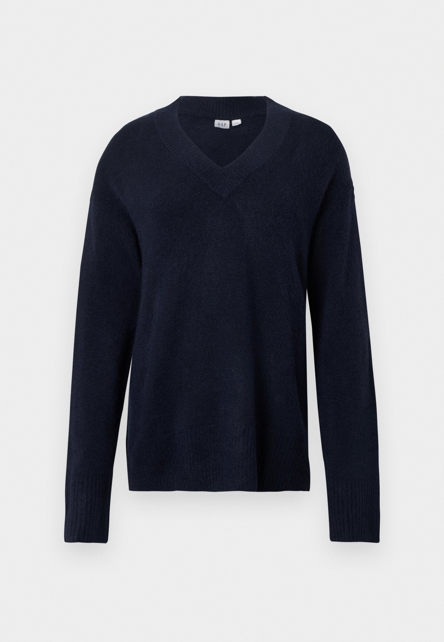Marineblauer V-Ausschnitt-Pullover aus weichem Strickstoff. Mit langen Ärmeln sowie gerippten Bündchen an Ärmeln und Saum. Einfaches und klassisches Design.