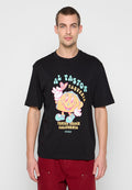 Schwarzes Baumwoll-T-Shirt mit einer bunten Grafik eines Taco-Charakters und dem Text "AL PASTOR TAQUERIA" sowie "VENICE BEACH CALIFORNIA" darunter.