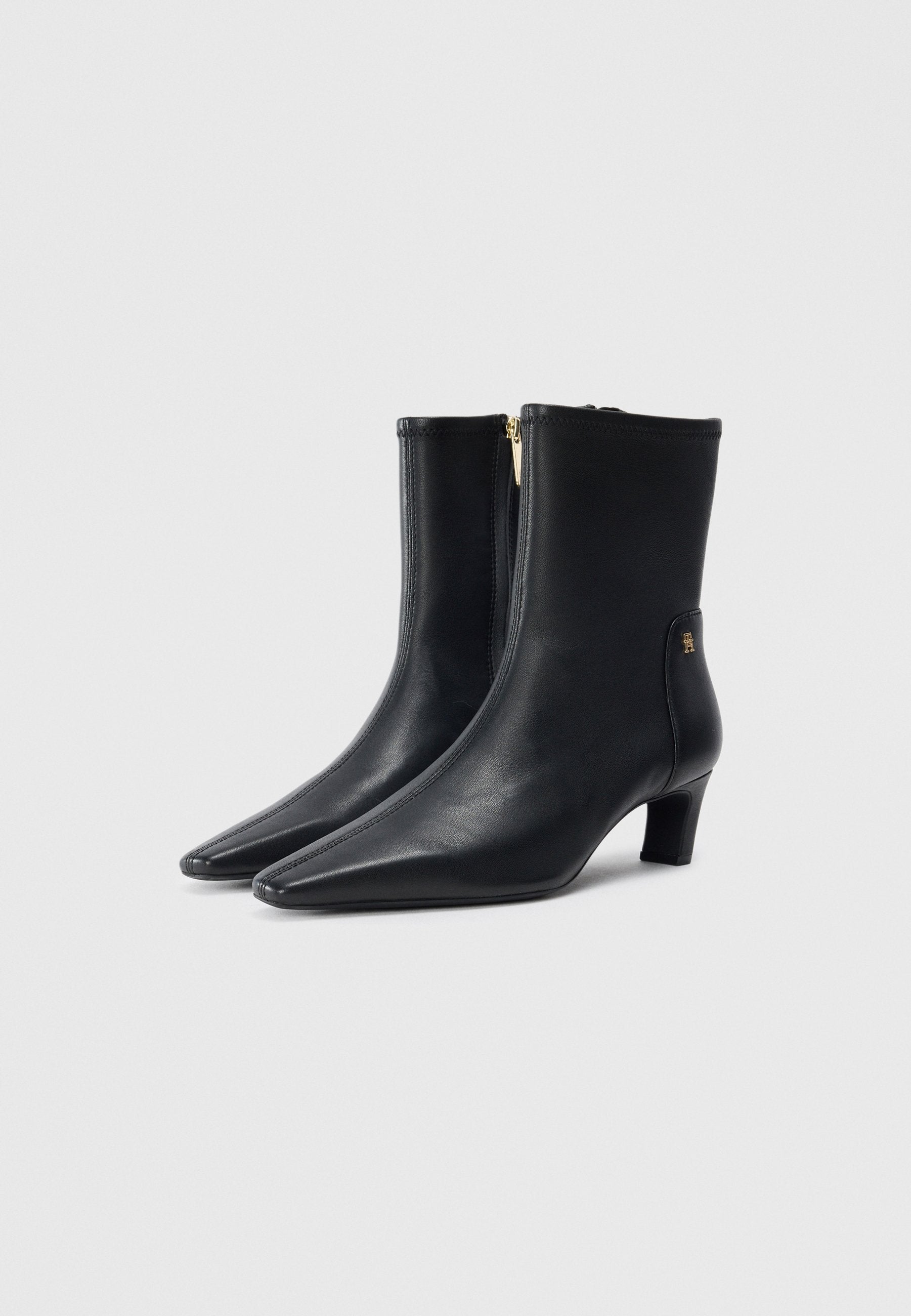 TH MONOGRAM PLAQUE LEATHER MID BOOTS Media 2