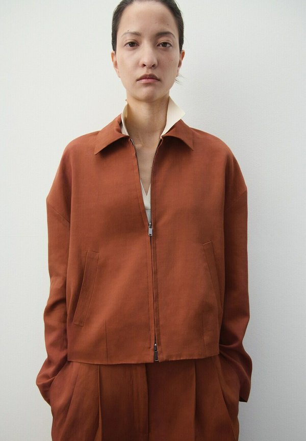 Mango Faux leather jacket - orange