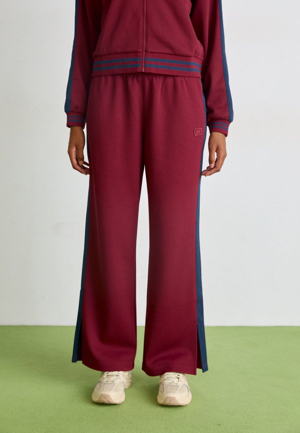 New Balance POST SEASON TRACK PANT - Tracksuit bottoms - red