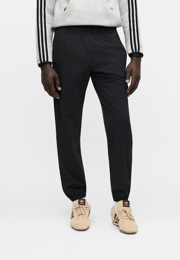 adidas Originals Tracksuit bottoms - black