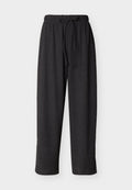 Schwarz strukturierte Loose-Fit-Hose mit elastischem Bund und Kordelzug, gerades Bein, geeignet für Freizeitkleidung.