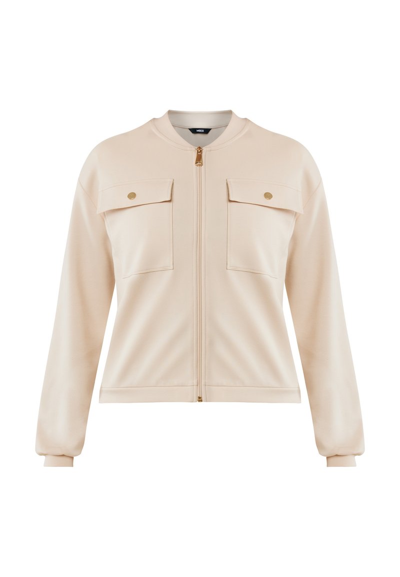 Beige Zip-Hoodie mit zwei Brusttaschen, goldenen Beschlägen, gerippten Bündchen und Rundhalsausschnitt. Glatte Textur und lässige Passform.