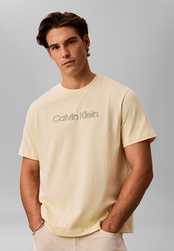 Calvin Klein Jeans CALVIN KLEIN JEANS RELAXED LOGO T-SHIRT - Print T-shirt - vanilla custard