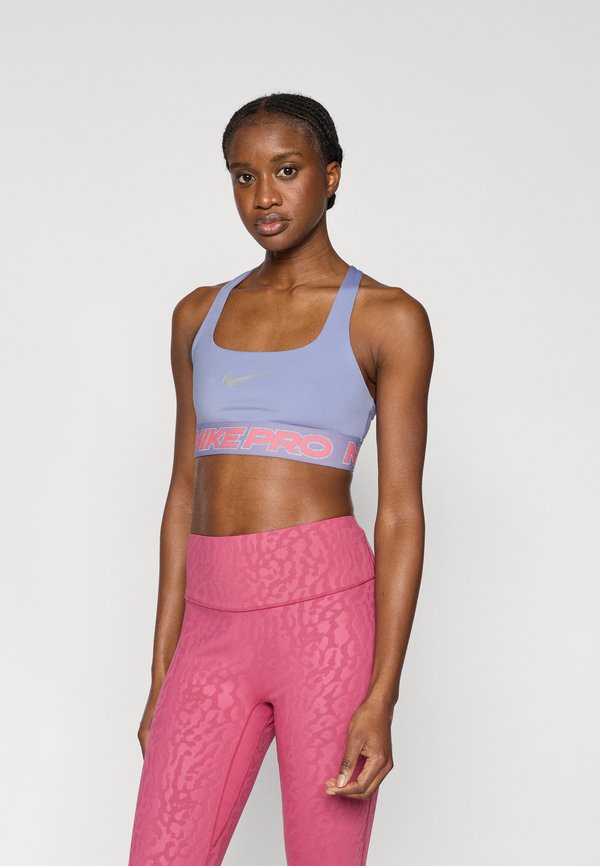 Nike Performance W NP DF BRA TT GRX - Medium support sports bra - iron purple/sea coral/metallic silver-coloured