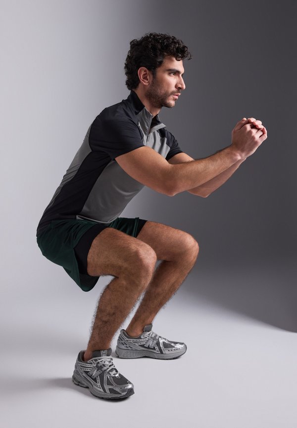 Pier One Sport by Zalando SHORT SLEEVE CYCLING JERSEY WITH 1/4 ZIP AND BACK POCKET