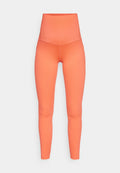 Hochtaillierte Leggings aus einem flachen, lebhaften orangenen Stoff. Mit seitlichen Taschen, nahtloser Verarbeitung und einem figurbetonten Design.