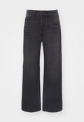 Weite, dunkelblaue Jeans mit hochgeschnittenem Bund, Knopfverschluss und Fünf-Taschen-Design, das eine gleichmäßige Textur und durchgehend dunkle Farbe aufweist.