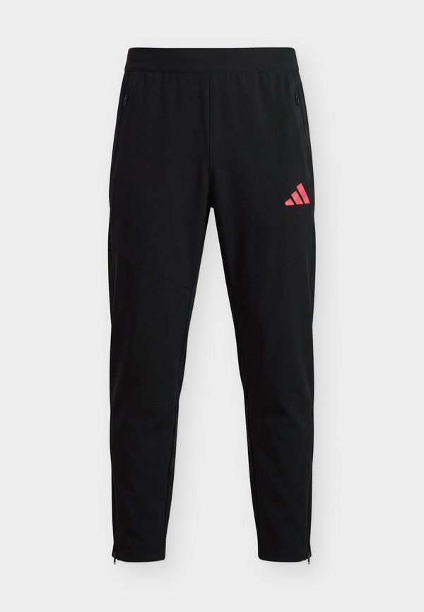 adidas Performance TIRO TRAVEL PANTS - Tracksuit bottoms - black/power pink