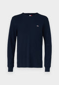 Marineblaues Langarmshirt aus strukturiertem Strickstoff mit Rundhalsausschnitt und gerippten Bündchen, mit einem kleinen Logo auf der Brust.