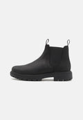 Schwarze Leder-Chelsea-Stiefel mit elastischen Seiten, Zugschlaufen, runder Zehenpartie und robustem Gummisohle. Glatte Textur und minimalistisches Design.