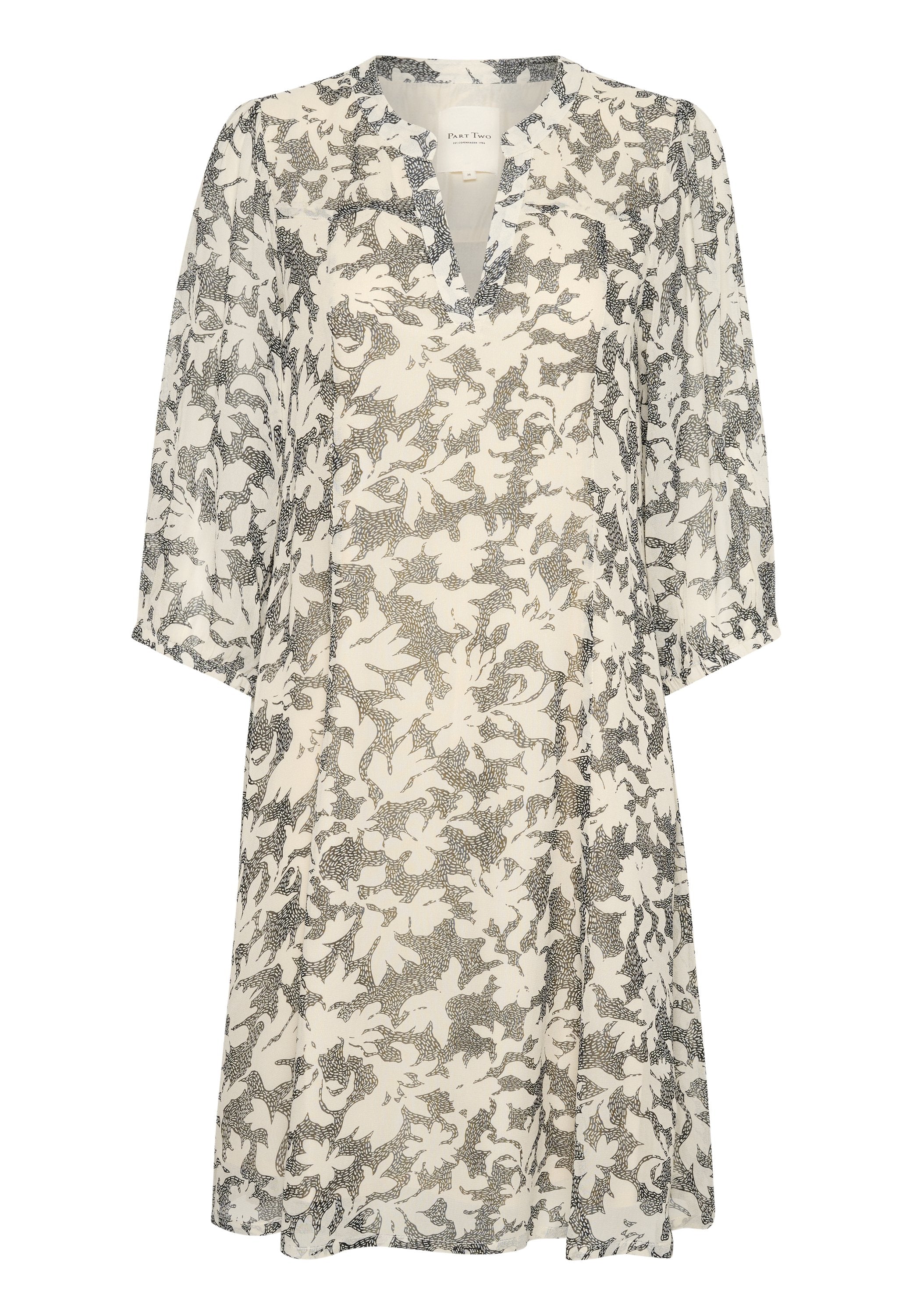 Blumenmuster-Kleid in Creme und Schwarz. V-Ausschnitt, Dreiviertelärmel, knielang, aus leichtem Material mit fließendem Design.