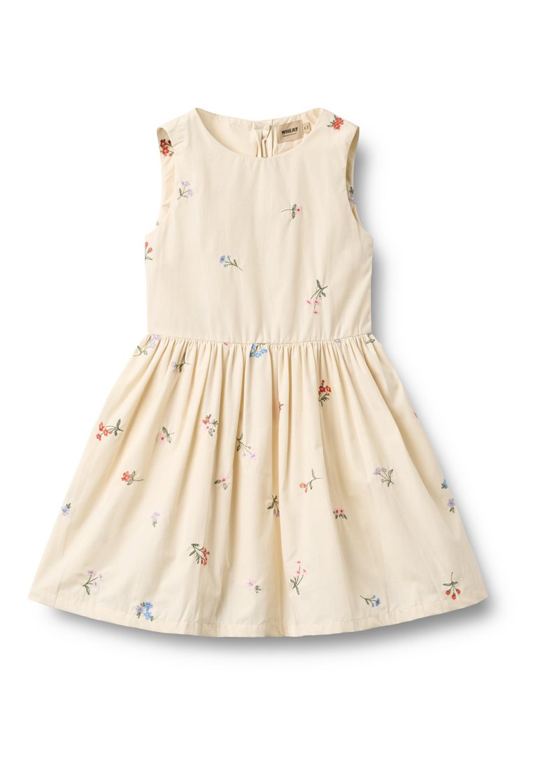 Ärmelloses Kleid aus hellbeigem Baumwollstoff mit mehrfarbiger Blumenstickerei. Ausgestellter Rock mit gerafften Taillendetails. Verschluss mit Knöpfen auf der Rückseite.