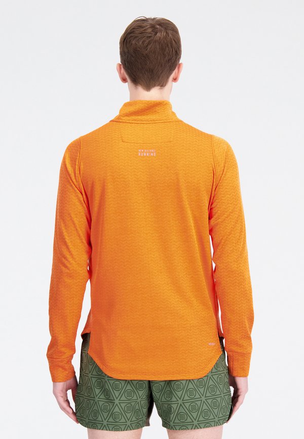New Balance HEAT GRID HALF ZIP