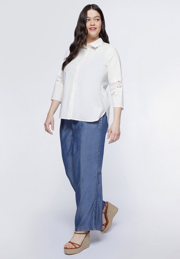 Fiorella Rubino CON BORDI IN MACRAMÉ