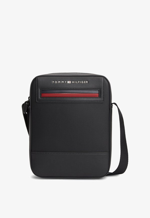 Tommy Hilfiger METAL LOGO CROSSBODY REPORTER BAG - Cross body bag - black