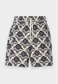 Bedruckte Shorts in Creme mit navyfarbenem Blumenmuster, ausgestattet mit einem elastischen Bund und Kordelzug, aus leichtem Stoff gefertigt.