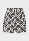 Bedruckte Shorts in Creme mit navyfarbenem Blumenmuster, ausgestattet mit einem elastischen Bund und Kordelzug, aus leichtem Stoff gefertigt.