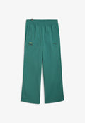 Puma ASTON MARTIN ARAMCO TEAM LIFESTYLE OVERSIZED  - Tracksuit bottoms - green lux