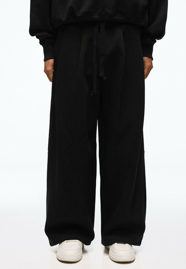Bershka BONDED WIDE LEG - TRACKSUIT BOTTOMS - Tracksuit bottoms - black