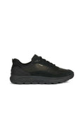 Schwarze Sportschuhe aus einer Kombination aus glattem Leder und Wildleder, mit runder Form, Schnürsenkeln und einer strukturierten Gummisohle.