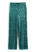 Taillierte, weite Velours-Hosen in Teal mit einem strukturierten Tiermuster. Elastischer Bund für Komfort und mit einer glatten Oberfläche.