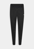 Puma TEAMRISE TRAINING PANTS - Tracksuit bottoms - black/white