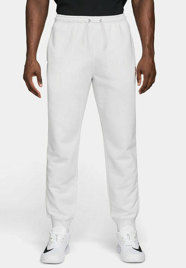 Nike Performance NIKECOURT HERITAGE PANT JOGGER - Tracksuit bottoms - white