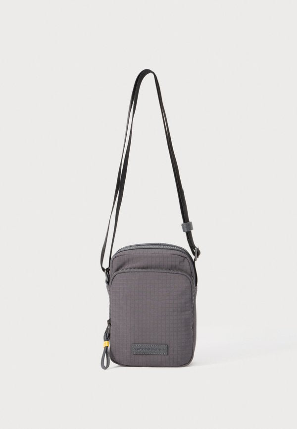 Tommy Hilfiger CASUAL TECH MINI REPORTER UNISEX - Cross body bag - charcoal gray