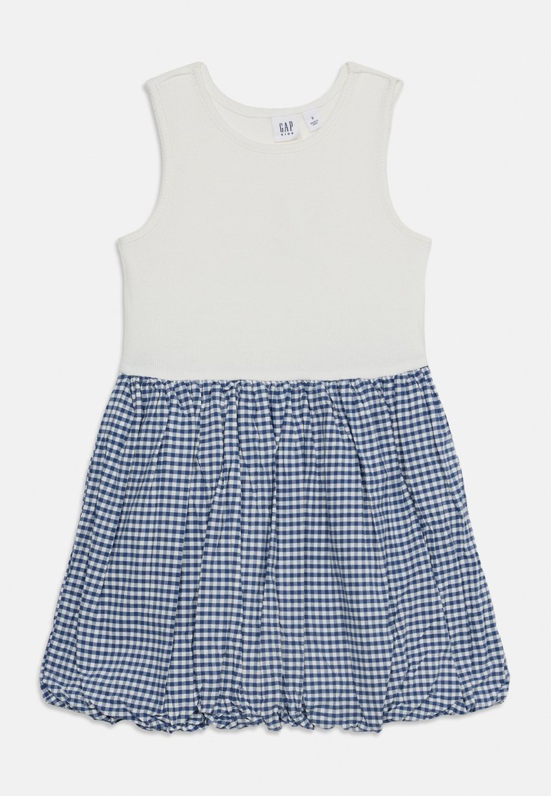 Ärmelloses weißes Oberteil mit einem blau-weiß karierten, gerafften Rockteil für Kinder.