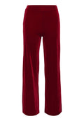 Samte, weit geschnittene Hosen in tiefrot. Mit elastischem Bund und glatter Textur ohne sichtbare Hardware oder Muster.