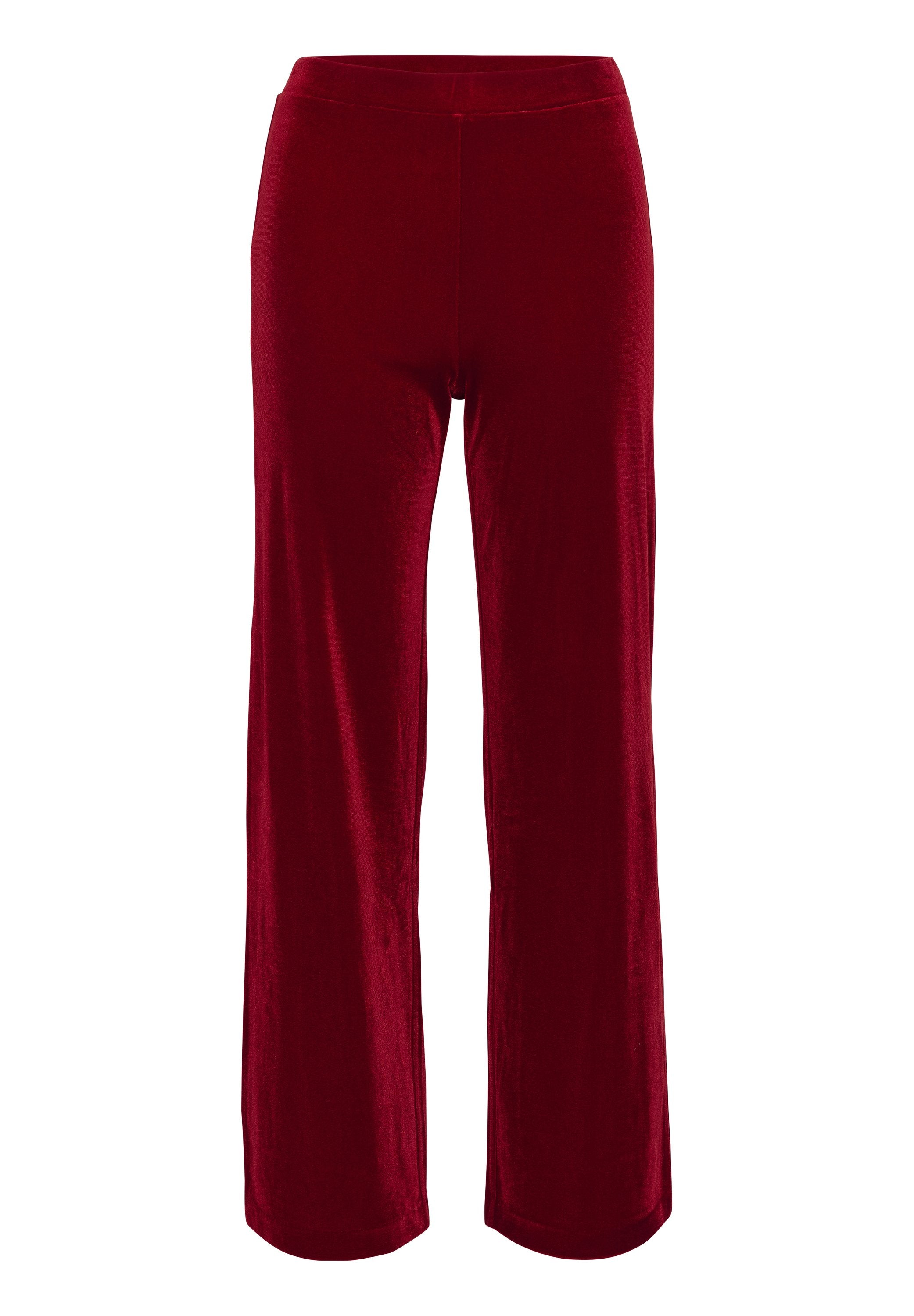 Samte, weit geschnittene Hosen in tiefrot. Mit elastischem Bund und glatter Textur ohne sichtbare Hardware oder Muster.