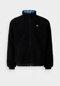 Schwarze Fleecejacke mit hohem Kragen, Frontreißverschluss, elastischen Bündchen und Saum; verfügt über ein blaues und kariertes Innenfutter. Kleines Logo-Detail auf der Brust.