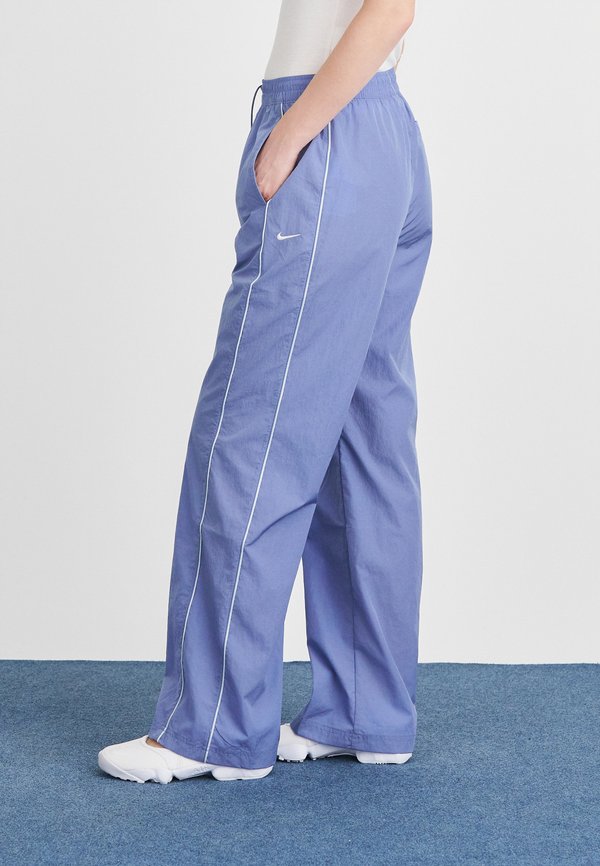 Nike Sportswear PANT - Tracksuit bottoms - world indigo/pure platinum coloured/sail
