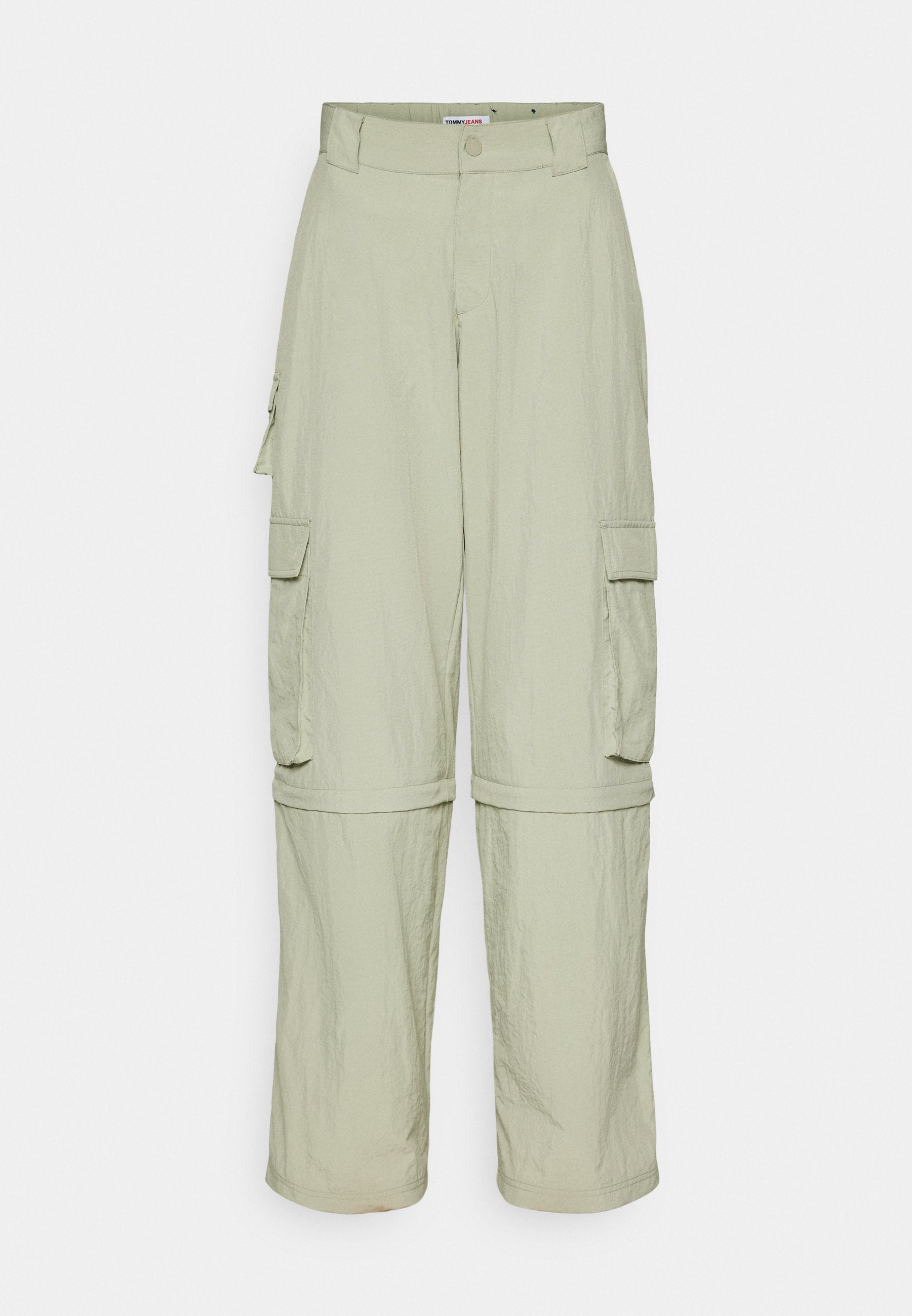 Helle beige Cargo-Hosen mit Gürtelschlaufen, seitlichen Klapptaschen und abnehmbaren Beinen, die zu Shorts umgewandelt werden können.