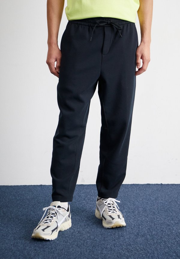 Nike Sportswear 24.7 IMPOSSIBLYSOFT - Tracksuit bottoms - black