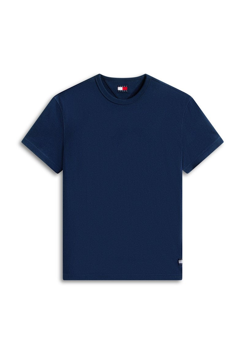 Marineblaue kurzärmelige T-Shirt aus strukturiertem Strick mit Rundhalsausschnitt und kleinem rot-weiß-blauem Logotag am Hals- und Saumbereich.